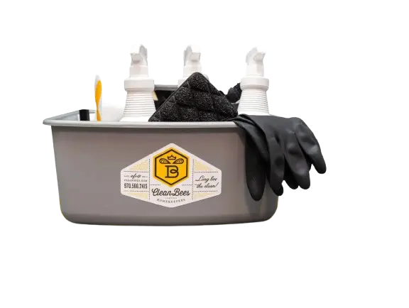 A professional cleaning caddy with supplies for cleaning by Clean Bees Homekeepers in Fort Collins.